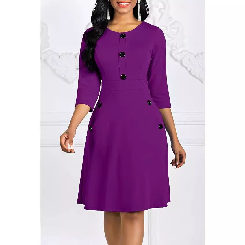 Robe de couleur unie pour femmes européennes et américaines automne et hiver col rond manches 34 bouton taille serrée