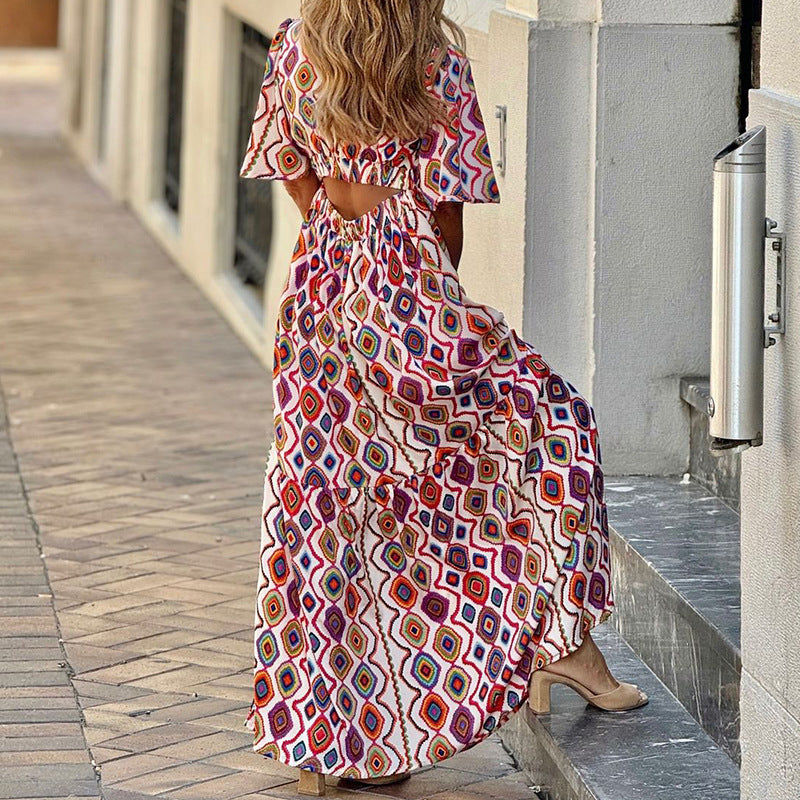 Vestido bohemio de largo medio con escote en V y estampado de moda