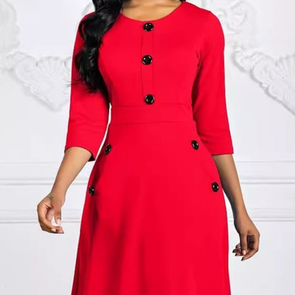 Robe de couleur unie pour femmes européennes et américaines automne et hiver col rond manches 34 bouton taille serrée