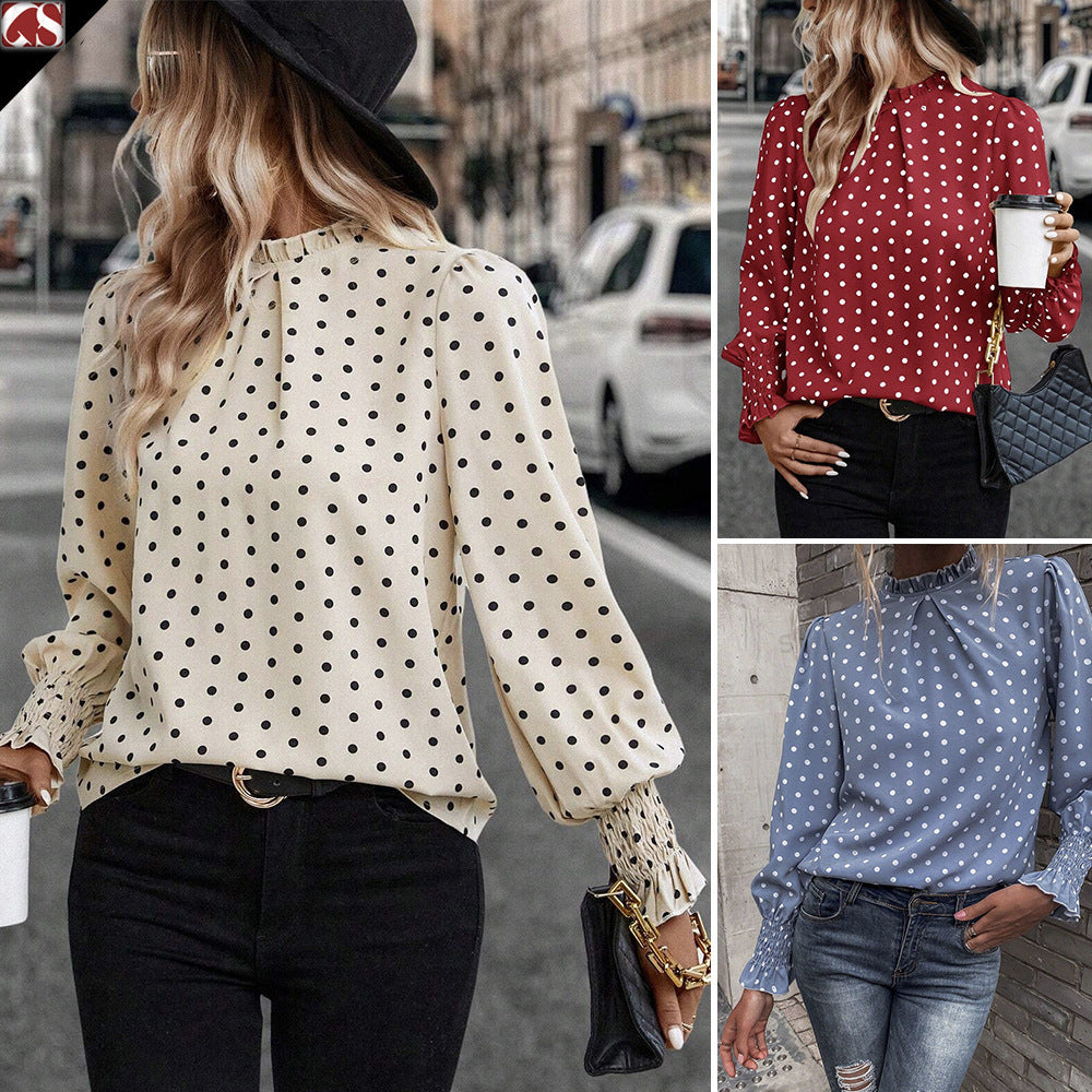 Camisa elegante de mujer con mangas abullonadas y estampado de lunares