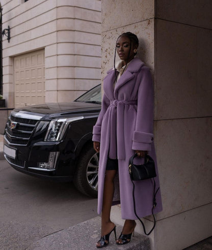 Manteau en fausse fourrure allongé aux genoux pour femmes