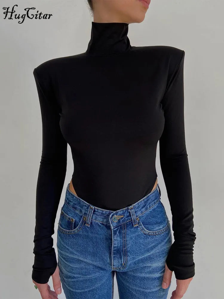 Hugcitar Turtleneck Long Sleeve Black Shoulder Pads Backless Sexy Bodycon Bodysuit Women Fashion Romper Streetwear Nightclub Y2K