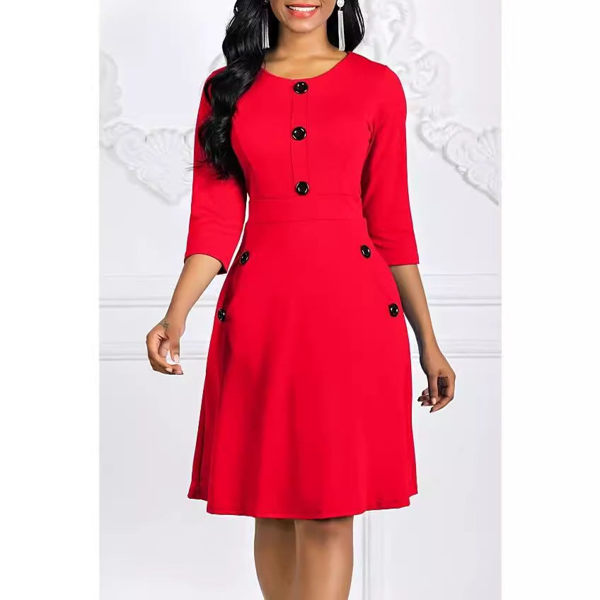 Robe de couleur unie pour femmes européennes et américaines automne et hiver col rond manches 34 bouton taille serrée