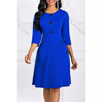 Robe de couleur unie pour femmes européennes et américaines automne et hiver col rond manches 34 bouton taille serrée