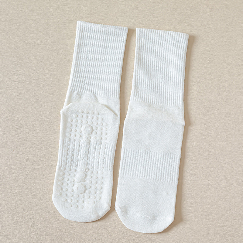 Chaussettes de yoga mi-mollet antidérapantes à semelle en silicone pour femmes