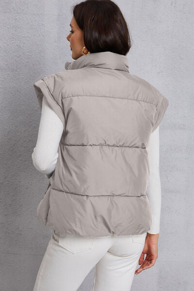 Manteau gilet avec poche et col roulé zippé