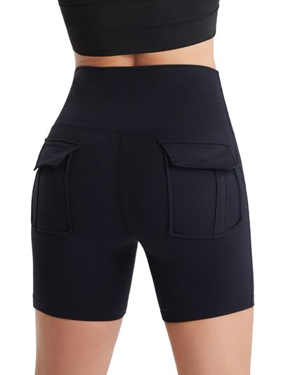 Shorts activos de cintura alta con bolsillos