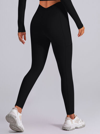 Leggings activos de cintura alta con bolsillos