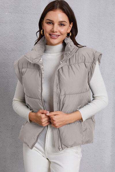 Manteau gilet avec poche et col roulé zippé