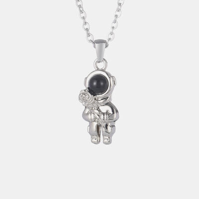 Collar de acero inoxidable con colgante de astronauta y piedra ojo de gato